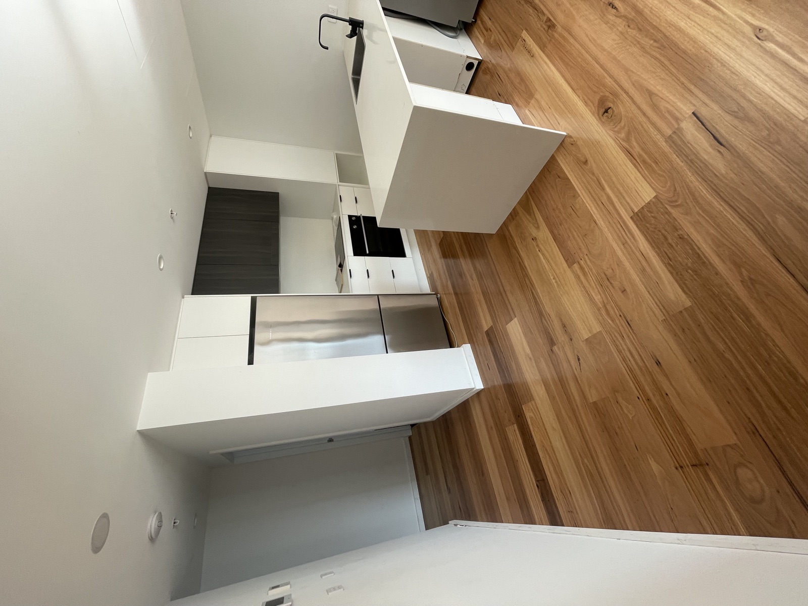 Open-plan kitchen & timber flooring — Newcastle