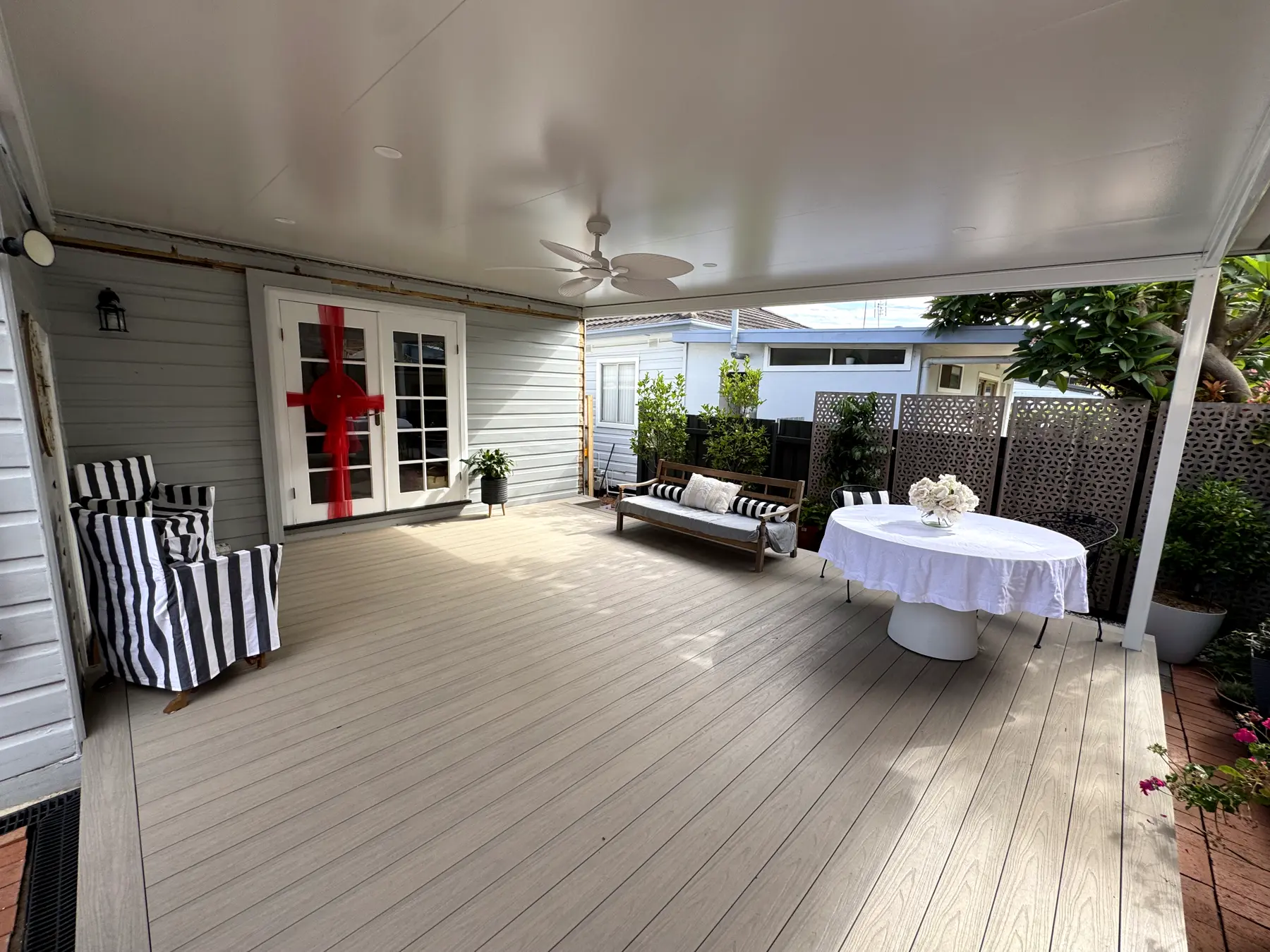 Finished composite deck under a Cooldek pergola, Merewether