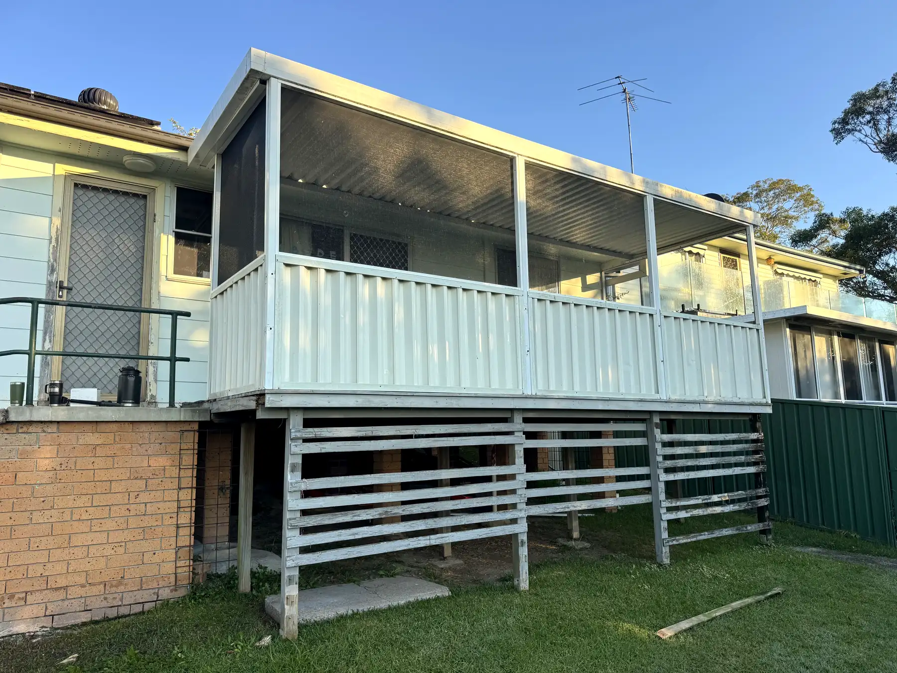 Sunroom rebuilt as an enclosed deck before, Blackalls Park