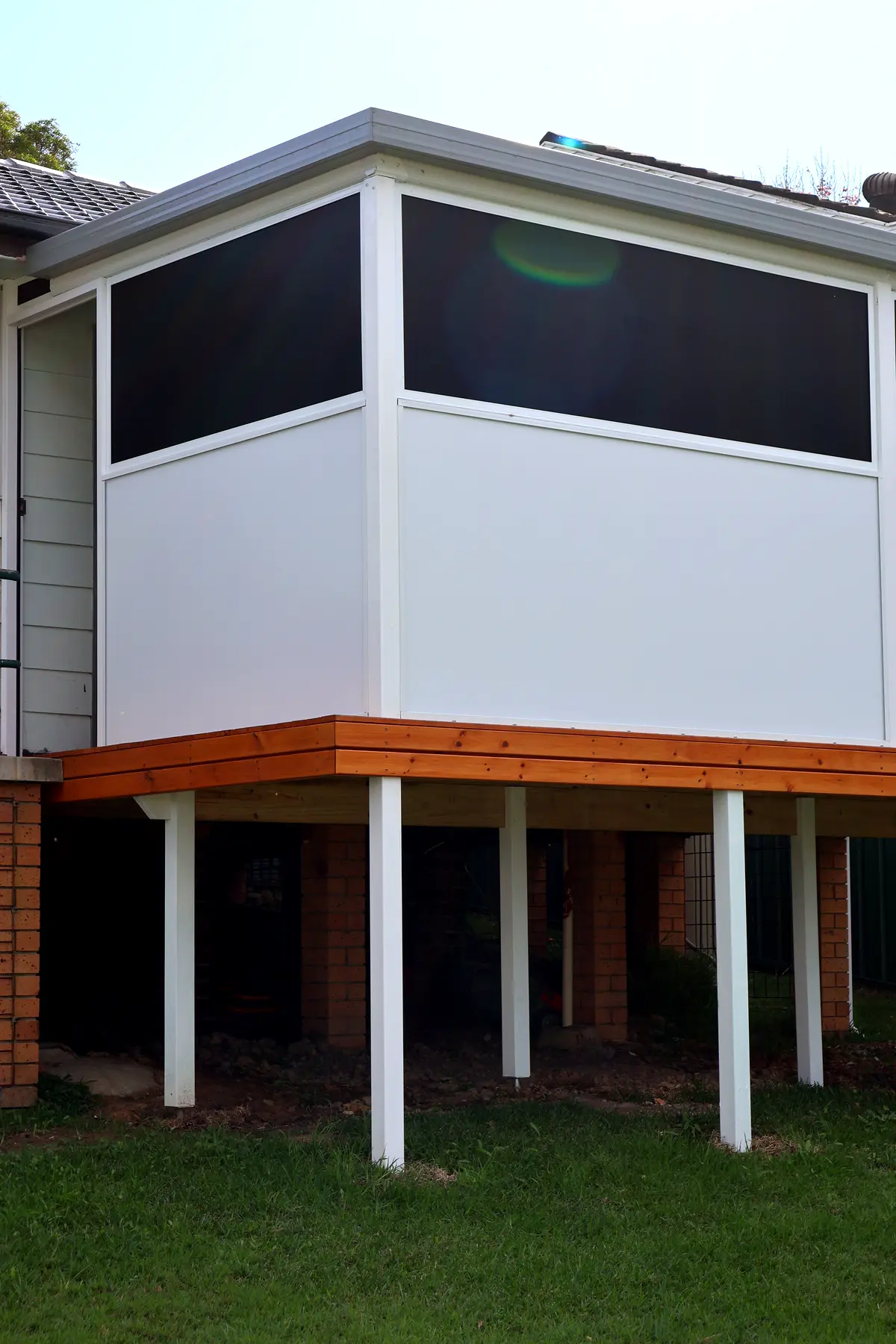 Sunroom rebuilt as an enclosed deck, Blackalls Park — photo 3